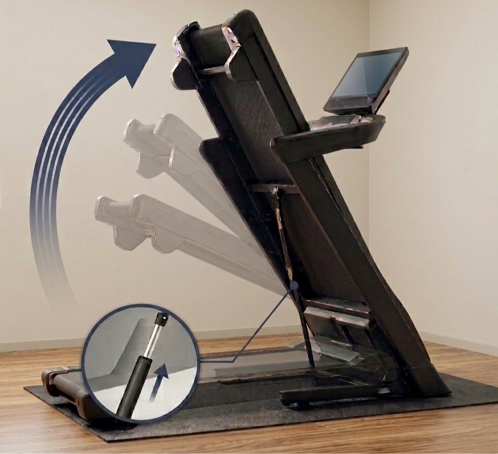 Demonstration of the  fold-up deck of a treadmill.